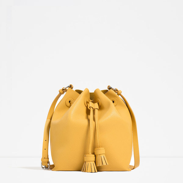 TASSELLED BUCKET BAG