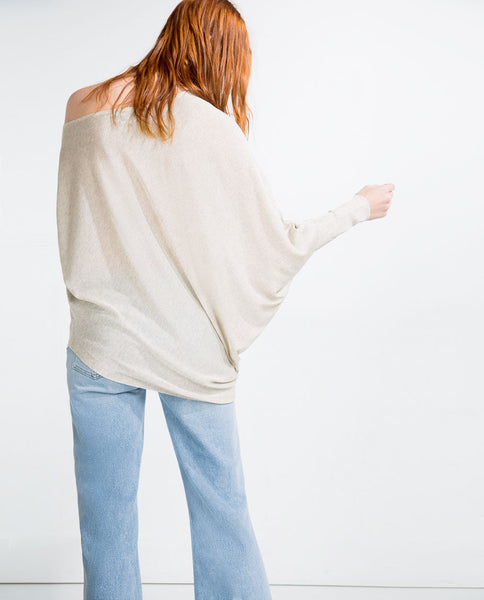 ASYMMETRIC SWEATER